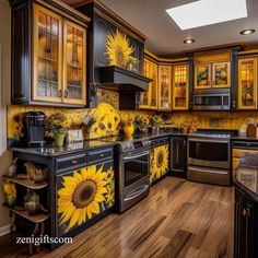 a kitchen with sunflowers painted on the cabinets