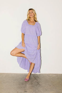 our bestselling daymaker dress is flowy, flirty, + full of styling possibilities // the perfect violet purple maxi dress, it has a relaxed silhouette + features puff sleeves + a stretchy scoop neckline. Purple Maxi, Purple Maxi Dress, Violet Purple, Tier Skirt, Spandex Fabric, Puff Sleeves, Scoop Neckline, Puff Sleeve, Scoop Neck