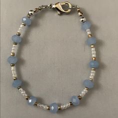 Handmade By Me, A Blue, White And Gold Small Bead Bracelet Accented In Silver. Bracelet Is 6 3/4” Long. Costume Jewelry Bracelets, Bracelets With Square Beads, See Bead Bracelets, Simple Handmade Bracelets, Duo Bead Bracelets, Cute Couple Beaded Bracelets, Blue Bracelets Diy, Beads Bracelet Design Blue, Blue And Silver Beaded Bracelets