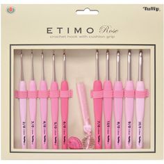 six pink toothbrushes in a box with the words etmo on it's side