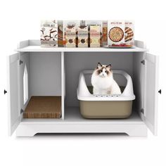 a cat sitting in a litter box on top of a shelf next to some food