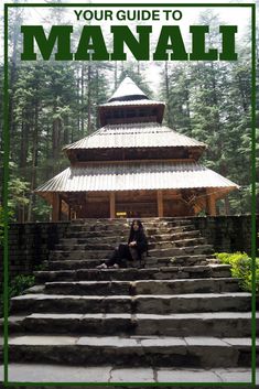 a woman sitting on some steps in front of a building with the words your guide to mana