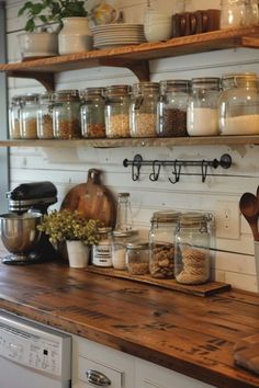 the shelves are filled with many different types of food and cooking utensils on them