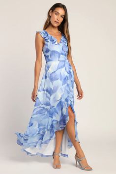 Take your soiree looks to the next level in the Lulus Elevate the Occasion Blue Floral Print Ruffled Wrap Maxi Dress! Lightweight woven fabric, with a large-scale floral print throughout, shapes this summery wrap dress that has ruffled straps supporting a V-neck bodice, atop an overlapping skirt that secures with a side tie. Skirt has a high-low maxi hem and finishes with tiered ruffled trim. Side Tie Skirt, Semi Formal Wedding Attire, Beach Wedding Outfit, Casual Wedding Guest Dresses, Formal Wedding Attire, Beach Wedding Attire, Beach Wedding Guests, Beach Wedding Guest Dress, Spring Wedding Guest Dress