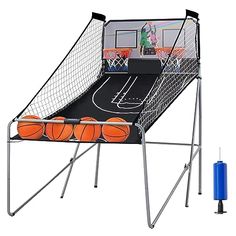 an inflatable basketball game set up on a stand with four balls and a blue marker