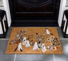 a door mat with halloween decorations on it