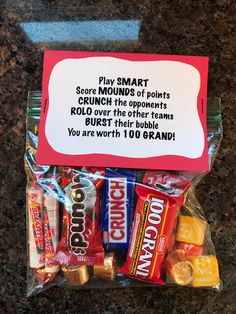 a candy bar bag with an information card on the top that says, play smart