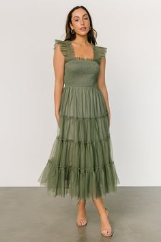 Add some magic to your wardrobe with our darling Emma Smocked Tulle Dress! The gorgeous tulle will make you feel magical! Soft Green Dresses, Baltic Born Green Bridesmaid Dress, Sage Green Tulle Bridesmaid Dresses, Tiered Ruffle Dress Sewing Pattern, Maternity Event Dress, Sage Boho Dress, Reusable Bridesmaid Dresses, Sage Green Dress Modest, Muted Green Dress