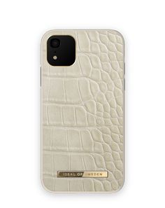 an iphone case with the text ideal of sweden on it in gold foil and white alligator skin