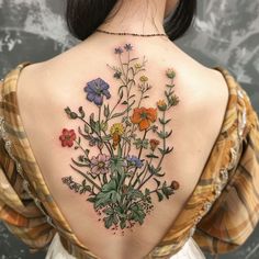 Wildflower Tattoo Design Set Painterly Tattoo Style, Women's Hand Tattoo Ideas, Colorful Vine Tattoo, Wildflower Hand Tattoo, Warp Around Arm Tattoo, Delicate Floral Sleeve Tattoo, Flower Garden Tattoo Sleeve, Kudzu Tattoo, Color And Black Tattoo