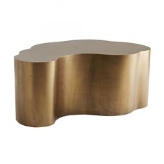 an oval shaped table with gold paint on it