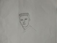 a pencil drawing of a man with a mohawk