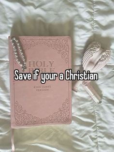 a pink book with the words save if your a christian written on it next to a spoon