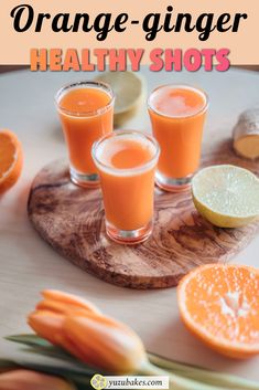 orange ginger healthy shots on a cutting board