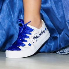 The high-review Personalized Sweet 15 Sneakers match that beautiful quinceañera dress. Quinceañera Hand-made Stars and Moon, low-top Sneakers, for the celebration of a girl's 15th birthday, marking her passage from girlhood to womanhood. Make a statement with stunning decorated quinces shoe custom canvas, bedazzled with rhinestones, glitter, and other beautiful details.🌟Includes🌟- The toe top is covered with bright rhinestones.- On the sides of the shoe (right & left), the idea/name/date is printed in solid or glitter color.🧡You will receive🧡- One pair of sneaker canvas off-brand- One pair of Laces in Silk (47")🙏Working together🙏- Please check our size chart to make sure you are ordering the right size. For double check, we will be happy to send pictures with measurements if you need Quince Royal Blue Shoes, Quinceanera Sneakers, Quince Shoes Sneakers, Royal Blue Quinceanera Ideas, Quinceañera Shoes, Blue Quinceanera Ideas, Quince Shoes, Quince Dances, Chambelanes Outfits