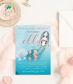 a little mermaid birthday party with pink and blue decorations, cards, envelopes and confetti