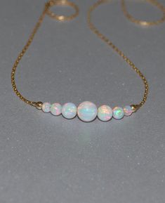 Opal Necklace Tiny Dot Necklace Small Opal by ModernJewelBoutique Gold And Opal Jewelry, Opal Aesthetic, Iridescent Jewelry, Horizontal Bar Necklace, Blue Opal Necklace, Dot Necklace, Necklace Opal, Dope Jewelry, Jewelry Lookbook