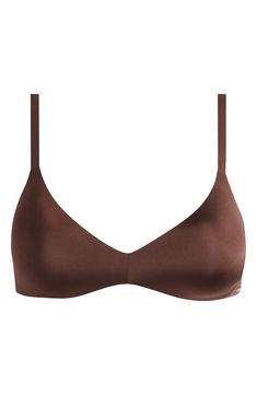 This plunge-style bra with soft, push-up foam pads offers the perfect amount of lift and support. The wireless style has lightly lined, cloud-like pads with wide microfiber wings for a smooth, seamless look. Clasps at back Adjustable straps Lined 84% polyamide, 16% elastane Machine wash, tumble dry Imported Hairstyling Products, Baby Gear Essentials, Rollerball Perfume, Makeup Gift, Beauty Sale, Fabric Gift Bags, Plunge Bra, Fragrance Design, Fabric Gifts