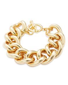 a gold chain bracelet on a white background