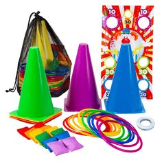 several different colored plastic cones and other items in front of a bag on a white background