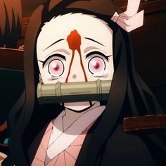 a woman with long black hair wearing a white mask and holding a pipe in front of her face