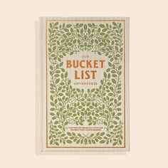 the bucket list adventure book is shown in front of a white background with green leaves on it