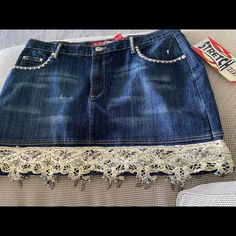 Indigo Denim Skirt With Lace And Silver Beaded Accent At Him And Silver Beads Accent Round Front Pockets. Zipper And Button Closure At The Front, No Pockets On The Back Size 16 . Lazer Jeans. Lace Denim Skirt, Jean Skirt With Lace, Distressed Denim Skirt Outfit, Denim Skirt With Lace, Bling Denim, Dark Denim Skirt, Demin Skirt, Random Fashion, 2000s Clothes