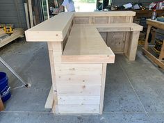 a workbench made out of wood in a garage