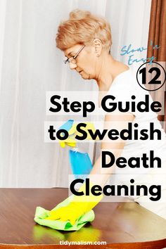 a woman cleaning a table with a sponge