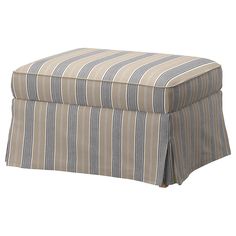 a striped ottoman with pleated skirting on the top and bottom, sitting in front of a white background