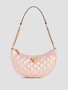 Iridescent diamond-quilted pebbled faux-leather shoulder bag Curved half moon silhouette Antique gold-tone hardware Enamel signature triangle emblem Multiple interior pockets Cotton-blend lining Top zip closure Chain and faux-leather shoulder strap with 11" drop 7" W x 4" H x 2" D Guess Bags Handbags, Cute Shoulder Bags, Pink Purses, Light Pink Purse, Popular Purses, Bag Guess, Moon Silhouette, Luxury Bags Collection, Quilted Shoulder Bag