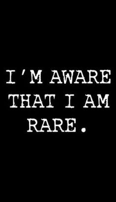 the words i'm aware that i am rare are written in white on a black background