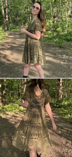 a woman in a dress is walking through the woods with her hands on her hips