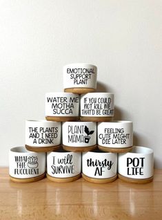 six ceramic bowls stacked on top of each other with the words, i love you more than