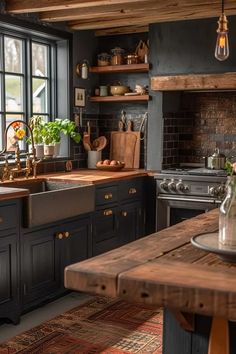 a kitchen with black cabinets and wooden counter tops, an old - fashioned stove top oven is in the center