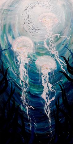 some very pretty jellyfish in the water