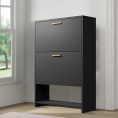 a black cabinet with two drawers in front of a window