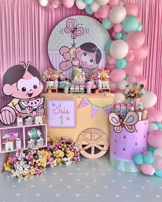 a birthday party with balloons and decorations