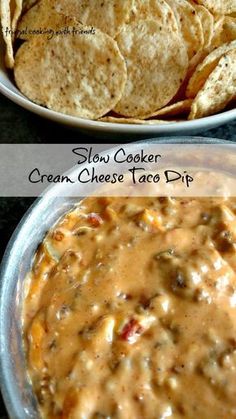 a bowl of slow cooker cream cheese taco dip with tortilla chips
