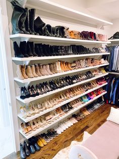 a shoe rack filled with lots of shoes