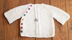 Round Neck Baby Cardigan with a side fastening knitting pattern | Couture, Baby Mittens Knitting Pattern, Newborn Cardigan, Knitting Pattern For Beginners, Baby Kimono, Baby Booties Knitting Pattern