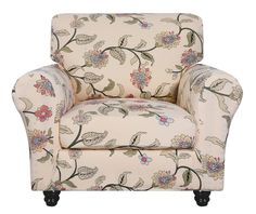 an upholstered chair with floral print on the back and arms, sitting against a white background