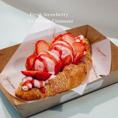 fresh strawberry ice cream croissant in a box