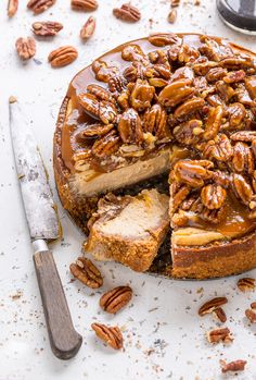 a pecan pie with one slice cut out and the rest on top of it