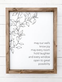 a wooden frame with a quote on it