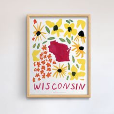 a framed art piece with the word wisconsin painted on it