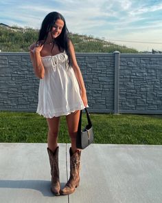 Cowgirls Boots Outfit, Desert Dress Outfit, Cowgirl Boots Styled, Summer Outfit Cowboy Boots, White Dress With Cowgirl Boots, Cute Stampede Outfits, Summer Dress And Boots, Cowgirl Boots Outfit Summer Casual, Sun Dress And Cowgirl Boots