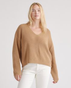 You loved our 100% Organic Cotton Fisherman Crew, so we put a fresh spin on it with the 100% Organic Cotton Fisherman V-Neck Sweater. With its relaxed fit, cropped length, and classic V-neck design, this sweater will be your new go-to for effortless style. Crafted from super-soft organic cotton in a wide ribbed knit, it's comfy and made to last. Also offered in sizes 1X-3X.  | Quince | Women's Fisherman V-Neck Sweater in Camel, Size Medium, Organic Cotton Leather Jacket With Hood, Silk Cami, Quarter Zip Sweater, Classic Wardrobe, Blouse Dress, Neck Design, Cotton Sweater, V Neck Sweater, Quince