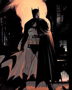 batman standing in the middle of a city at night with his cape open and bat out