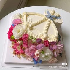 there is a cake with flowers on it